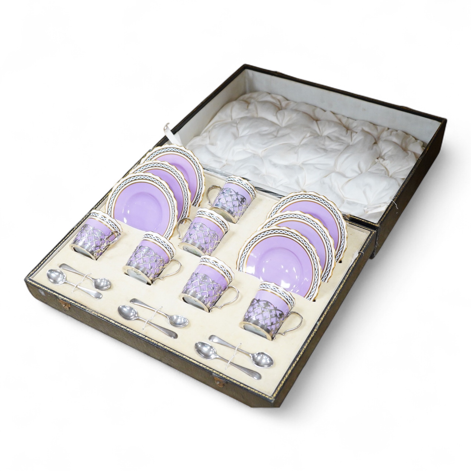 A cased Aynsley coffee set with silver mounted coffee cans and silver teaspoons, William Hutton & Sons, Sheffield, 1924, the leather case 38cm wide
